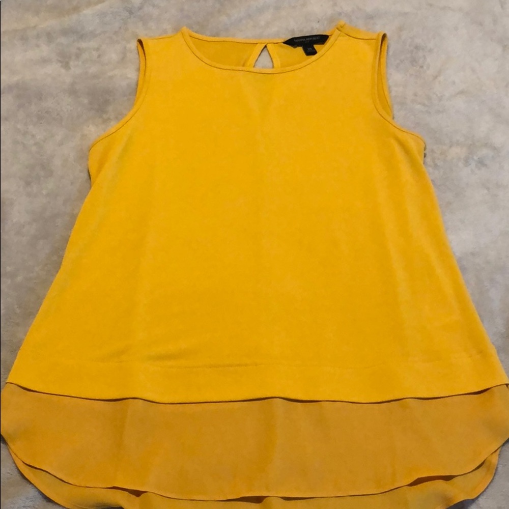 Yellow sleeveless top